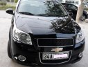 Chevrolet Aveo 2015 - Cần bán lại xe Chevrolet Aveo sản xuất 2015, màu đen còn mới, giá chỉ 288 triệu