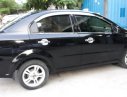 Chevrolet Aveo 2015 - Cần bán lại xe Chevrolet Aveo sản xuất 2015, màu đen còn mới, giá chỉ 288 triệu