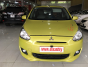 Mitsubishi Mirage 2014 - Cần bán xe Mitsubishi Mirage 2014, màu vàng, xe nhập, số tự động