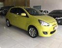 Mitsubishi Mirage 2014 - Cần bán xe Mitsubishi Mirage 2014, màu vàng, xe nhập, số tự động