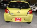 Mitsubishi Mirage 2014 - Cần bán xe Mitsubishi Mirage 2014, màu vàng, xe nhập, số tự động