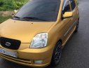 Kia Picanto 2004 - Cần bán Kia Picanto đời 2004, màu vàng, xe nhập