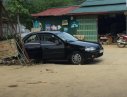 Mazda 323 1.6 MT 1998 - Bán xe Mazda 323 1.6 MT năm 1998, màu đen