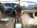 Daewoo Magnus 2004 - Bán Daewoo Magnus năm 2004, màu đen xe gia đình giá cạnh tranh