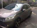 Peugeot 208 2014 - Cần bán lại xe Peugeot 208 đời 2014, màu nâu