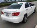 Toyota Corolla J 1.3 MT 2003 - Cần bán xe Toyota Corolla J 1.3 MT đời 2003, màu trắng chính chủ