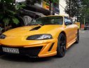 Mitsubishi Eclipse 2.0 MT 1996 - Cần bán Mitsubishi Eclipse 2.0 MT đời 1996, màu vàng, xe nhập