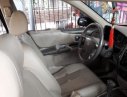 Ford Laser Ghia 1.8 AT 2005 - Bán Ford Laser Ghia 1.8 AT 2005, màu đen số tự động