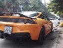 Mitsubishi Eclipse 2.0 MT 1996 - Cần bán Mitsubishi Eclipse 2.0 MT đời 1996, màu vàng, xe nhập