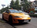 Mitsubishi Eclipse 2.0 MT 1996 - Cần bán Mitsubishi Eclipse 2.0 MT đời 1996, màu vàng, xe nhập