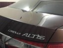 Toyota Corolla altis 1.8G MT 2015 - Cần bán gấp Toyota Corolla Altis 1.8G MT năm 2015, màu nâu số sàn