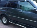 Ssangyong Musso 2.3 MT 2004 - Bán ô tô Ssangyong Musso GT đời 2004, màu xám 