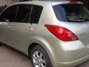 Nissan Tiida 1.8AT 2009 - Bán Nissan Tiida 1.8AT đời 2009, màu vàng, xe nhập