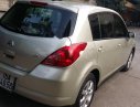 Nissan Tiida 1.8AT 2009 - Bán Nissan Tiida 1.8AT đời 2009, màu vàng, xe nhập