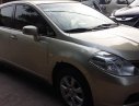 Nissan Tiida 1.8AT 2009 - Bán Nissan Tiida 1.8AT đời 2009, màu vàng, xe nhập