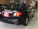 Toyota Corolla altis MT  2011 - Bán Toyota Corolla altis MT sản xuất 2011, màu đen