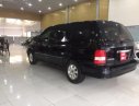 Kia Carnival LS 2.5 MT 2005 - Cần bán xe Kia Carnival LS 2.5 MT 2005, màu đen, giá tốt