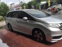 Honda Odyssey 2016 - Bán xe Honda Odyssey năm 2016, màu bạc xe gia đình