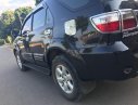 Toyota Fortuner 2.5G 2010 - Bán xe Toyota Fortuner 2.5G đời 2010, màu đen, 600 triệu