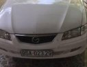 Mazda 626 2001 - Bán xe Mazda 626 đời 2001, màu trắng xe gia đình, 180tr