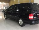 Kia Carnival   MT  2005 - Bán xe Kia Carnival MT đời 2005, màu đen giá cạnh tranh