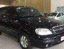 Kia Carnival   MT  2005 - Bán xe Kia Carnival MT đời 2005, màu đen giá cạnh tranh