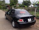 Mitsubishi Lancer  gala 2005 - Bán Mitsubishi Lancer gala đời 2005, màu đen xe gia đình, 250 triệu