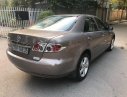 Mazda 6 2.0 MT 2006 - Bán Mazda 6 MT 2006, màu xám xe gia đình