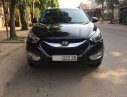 Hyundai Tucson 2012 - Bán Hyundai Tucson đời 2012, màu đen số tự động, giá 560tr