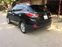 Hyundai Tucson 2012 - Bán Hyundai Tucson đời 2012, màu đen số tự động, giá 560tr