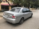 Mitsubishi Lancer 2004 - Cần bán Mitsubishi Lancer sản xuất 2004, màu bạc, 225tr