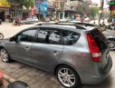 Hyundai i30 CW 1.6AT 2010 - Cần bán gấp Hyundai i30 CW năm 2010, màu xám, xe nhập