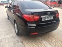 Hyundai Avante MT 2011 - Cần bán gấp Hyundai Avante MT năm 2011, màu đen