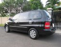 Kia Carnival GS 2007 - Cần bán gấp Kia Carnival GS đời 2007, màu đen ít sử dụng, giá chỉ 228 triệu