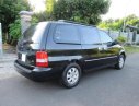 Kia Carnival GS 2007 - Cần bán gấp Kia Carnival GS đời 2007, màu đen ít sử dụng, giá chỉ 228 triệu