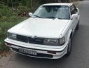 Nissan Bluebird 1.8 1990 - Bán ô tô Nissan Bluebird 1.8 trước 1990, màu trắng, xe nhập giá cạnh tranh