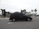 Kia Carnival GS 2.5 AT 2008 - Bán xe Kia Carnival GS 2.5 AT đời 2008, màu đen xe gia đình