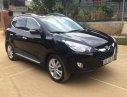 Hyundai Tucson 2011 - Cần bán Hyundai Tucson sản xuất 2011, màu đen, xe nhập