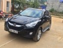 Hyundai Tucson 2011 - Cần bán Hyundai Tucson sản xuất 2011, màu đen, xe nhập