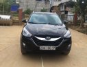 Hyundai Tucson 2011 - Cần bán Hyundai Tucson sản xuất 2011, màu đen, xe nhập