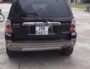 Ford Escape XLT 3.0 AT 2006 - Gia đình bán xe Ford Escape XLT 3.0 AT 2006, màu đen  