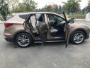 Hyundai Santa Fe  4WD 2016 - Bán Hyundai Santa Fe 4WD 2016, màu nâu