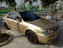 Ford Laser 2003 - Chính chủ bán xe Ford Laser đời 2003, màu vàng cát