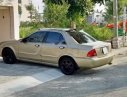 Ford Laser 2003 - Cần bán gấp Ford Laser đời 2003, màu vàng chính chủ