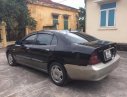 Daewoo Magnus 2004 - Cần bán lại xe Daewoo Magnus đời 2004, màu đen xe gia đình