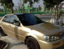 Ford Laser 2003 - Cần bán gấp Ford Laser đời 2003, màu vàng chính chủ