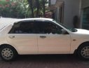 Ford Laser LX 1.6 MT 2000 - Cần bán xe Ford Laser LX 1.6 MT đời 2000, màu trắng xe gia đình