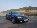 Daewoo Magnus 2004 - Bán xe Daewoo Magnus đời 2004, màu đen