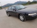 Mazda 626 1995 - Bán ô tô Mazda 626 đời 1995, màu đen, nhập khẩu như mới