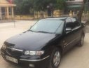 Mazda 626 1999 - Cần bán gấp Mazda 626 sản xuất năm 1999, màu đen, 130tr